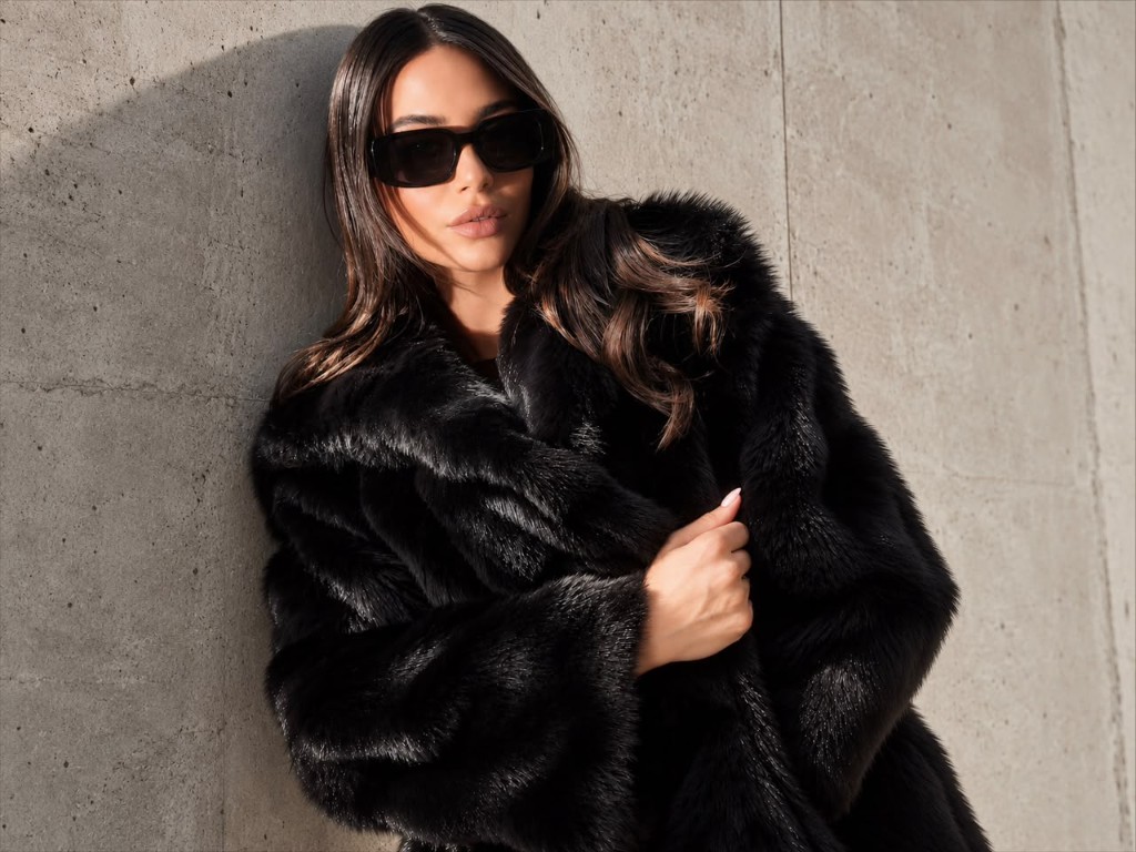 Woman in a black fur coat